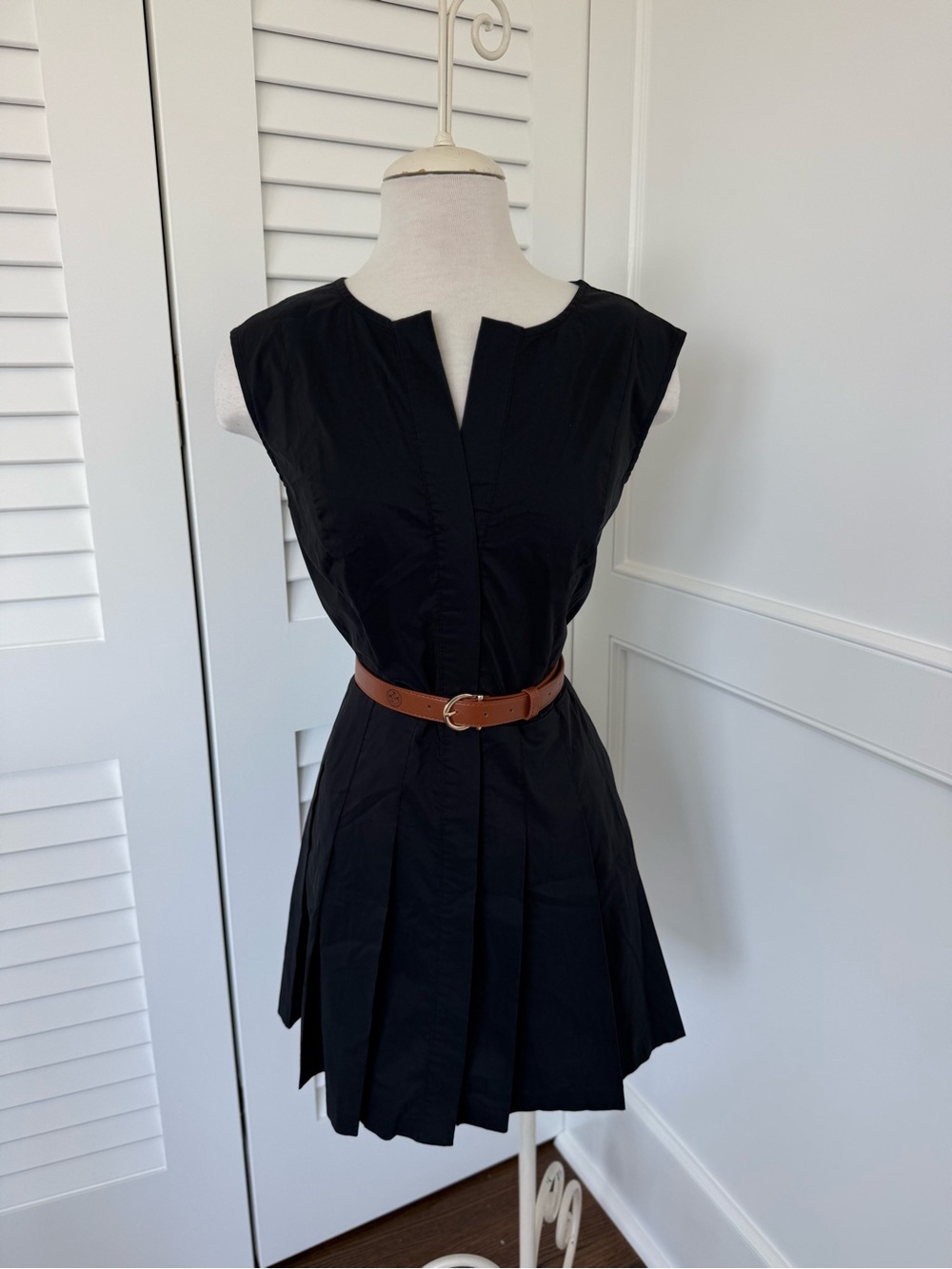 Classic Black Sleeveless Pleated Dress with Brown Waist Belt